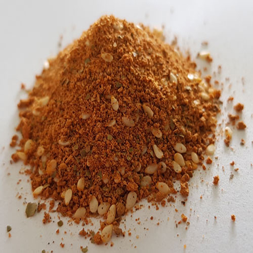 Red Desert Dust seasoning in a labeled jar, showcasing a rich, earthy blend of Australian native spices